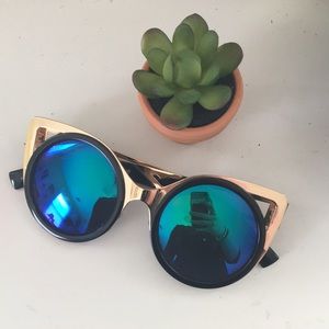 Blue green reflective cat eye sunglasses